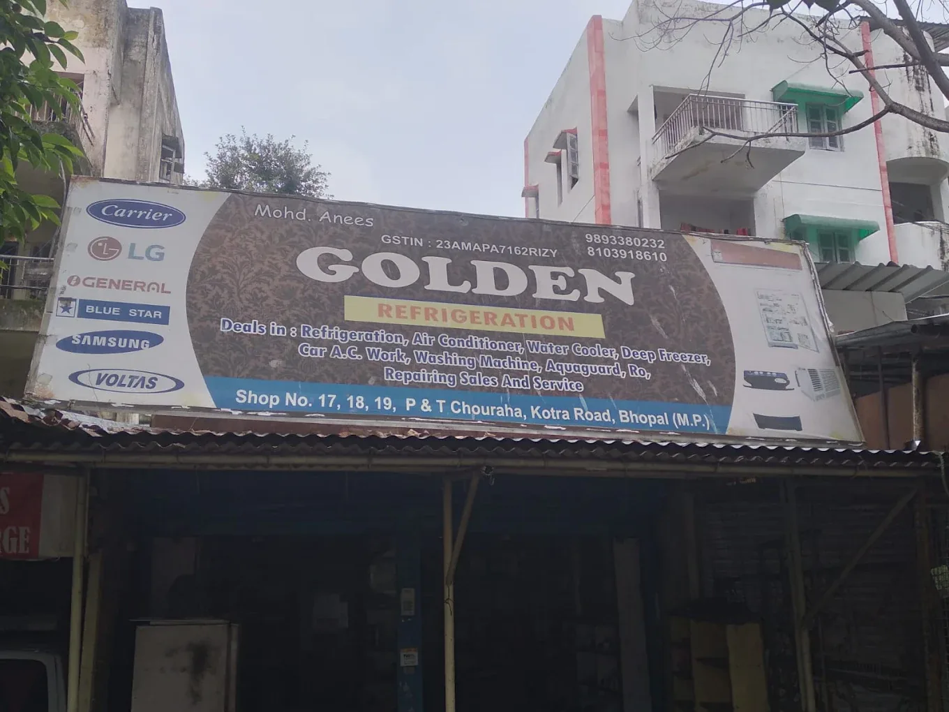 Golden Refrigeration shop sign at P&T Chouraha, Kotra Road, Bhopal